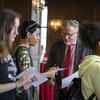 David Boardman speaking with a group of students in Mitten Hall